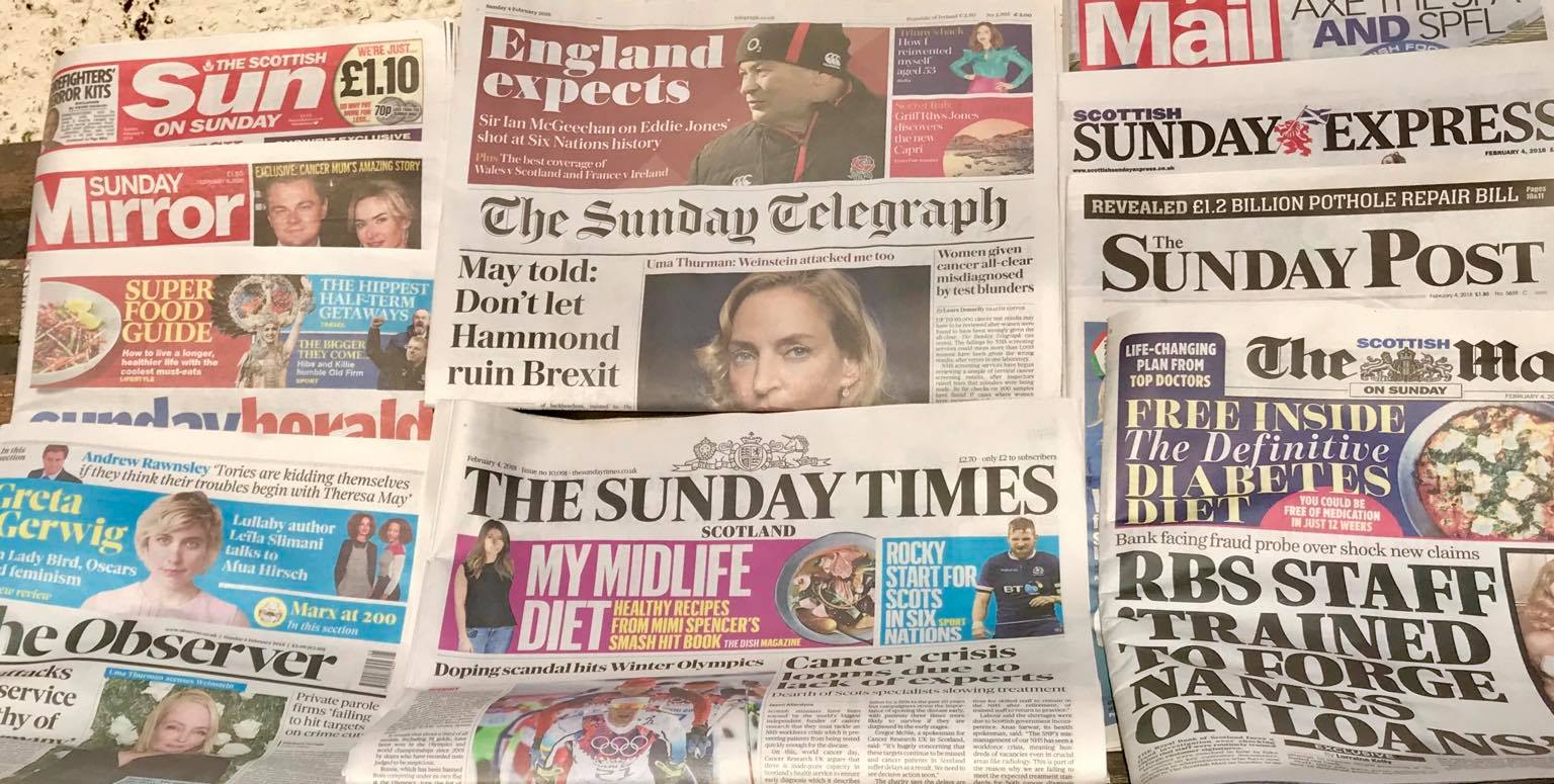 A spread of Sunday papers — Sun on Sunday, Sunday Telegraph, Mail on Sunday, Sunday Express, Sunday Post, Sunday Times Scotland, the Observer
